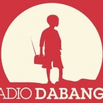 Sudanese boy holding radio