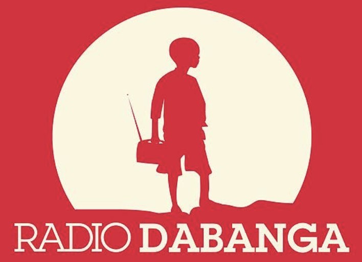 Sudanese boy holding radio